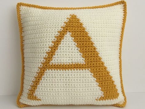Learn how to crochet intarsia Alphabet Cushions with Chloe Bailey