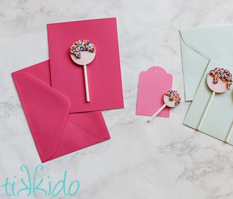 paper cut out lollipop with multicoloured sweets to decorate