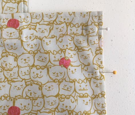 Pin your bag together.