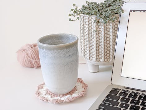 Learn how to crochet this floral inspired coaster