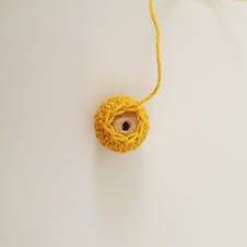 crochet bead with yarn tail unweaved