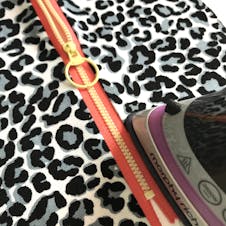 Iron pressing seam next to zip