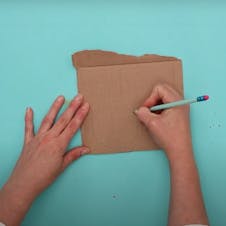 draw a flower in pencil to cut out