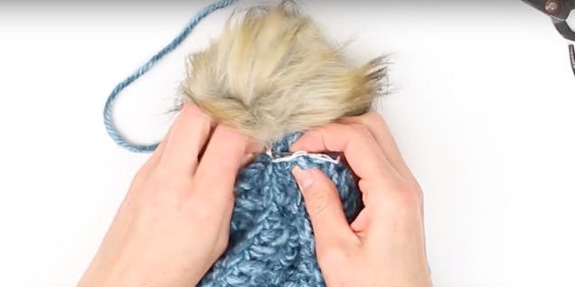 sew Pom Pom to crocheted beanie