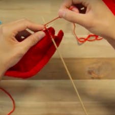 k2tog: yarn over to knit stitch