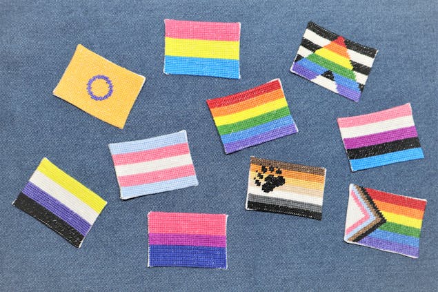 LGBTQIA+ Flag Patches on denim fabric
