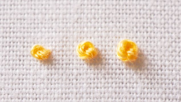 Row of french knots embroidery