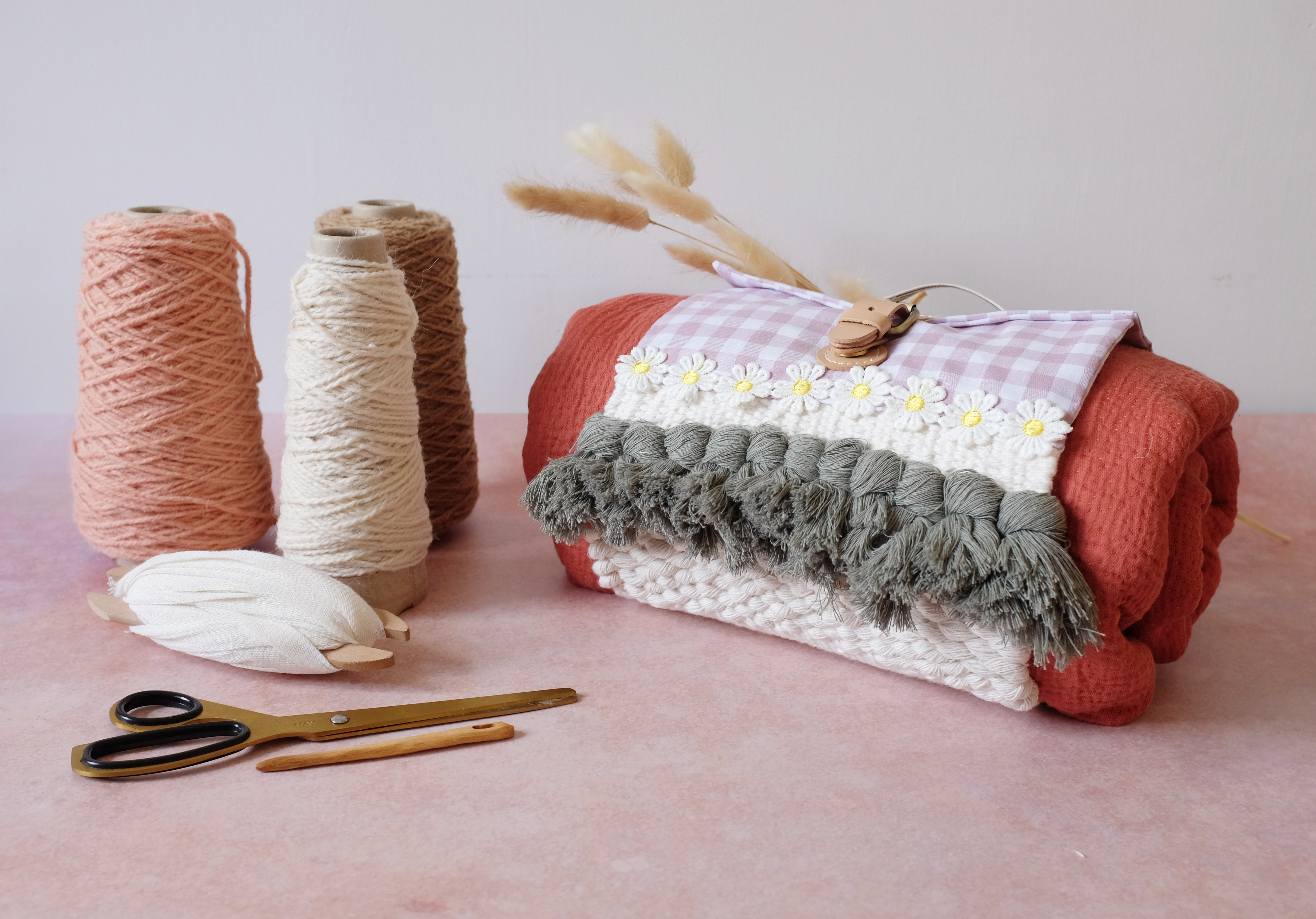 Woven picnic blanket holder, wool cones 