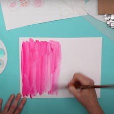 watercolour painting onto plain sheet of paper