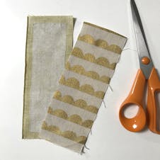 Front and back pieces showing interfacing ironed into place