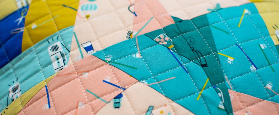 Learn how to make a crazy quilt cushion with this tutorial!