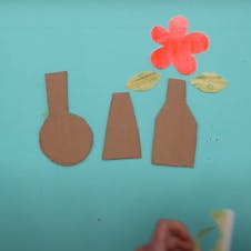 cut out vase shapes from cardboard