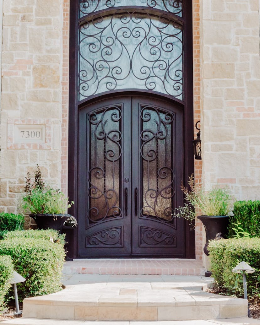 Transom door with decorative glass, allowing natural light to illuminate your space with elegance.