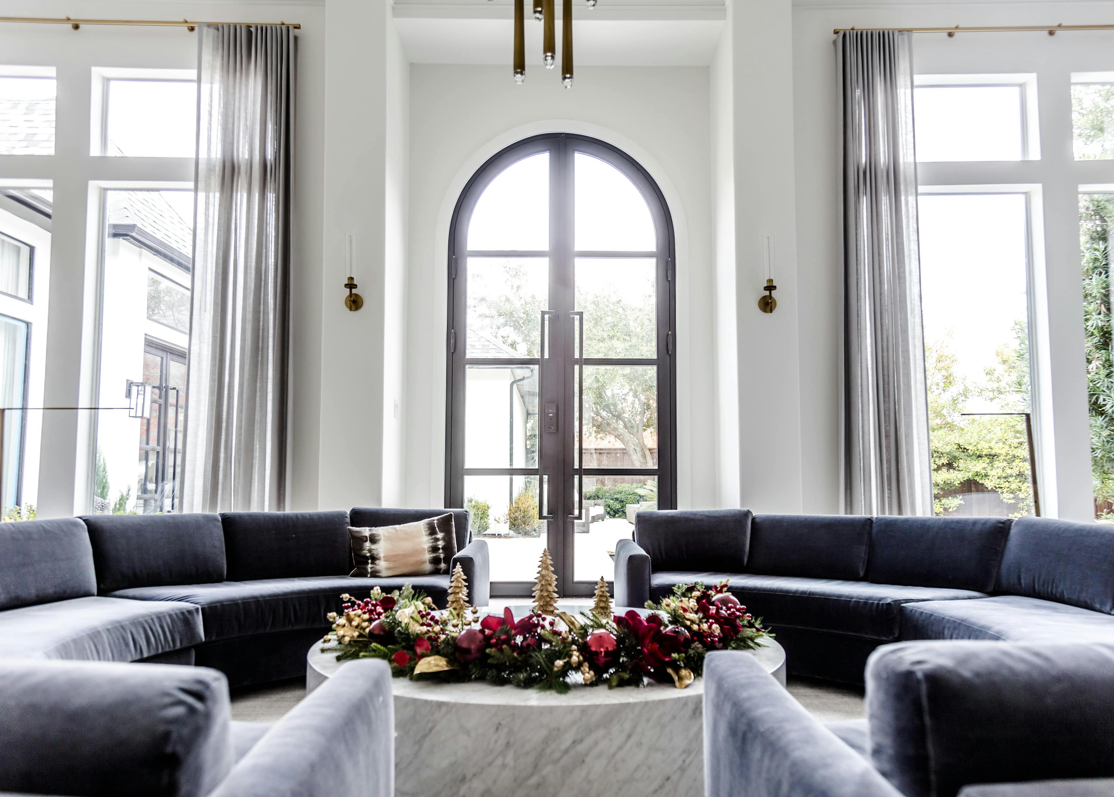 Luxurious iron double glass doors providing a seamless connection between indoor and outdoor spaces.