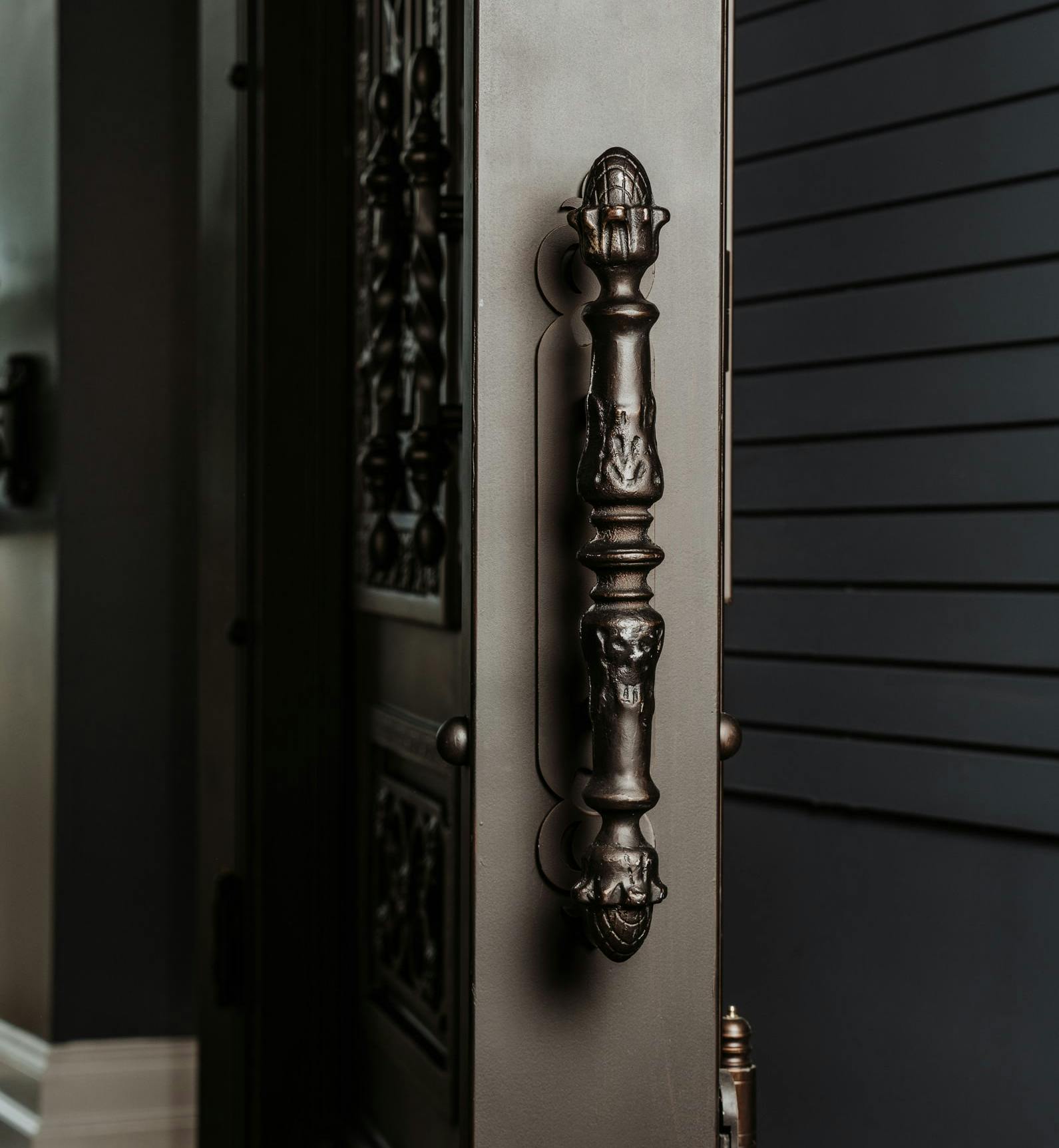 Chic and durable iron door handles, adding a touch of elegance to your entryway.