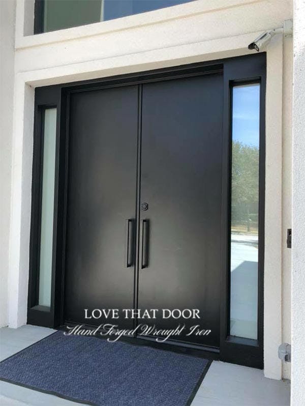Iron double doors with sleek and modern design for contemporary homes