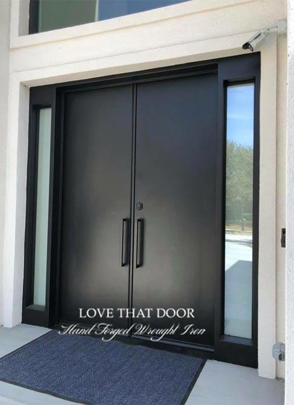 Iron double doors with sleek and modern design for contemporary homes