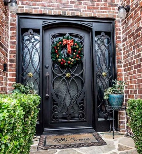 Elegant entry door with sidelights, welcoming guests with timeless sophistication.