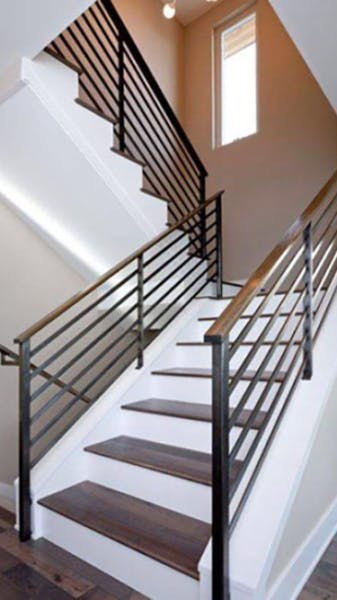 Modern iron railing offering a sleek and minimalist design aesthetic.