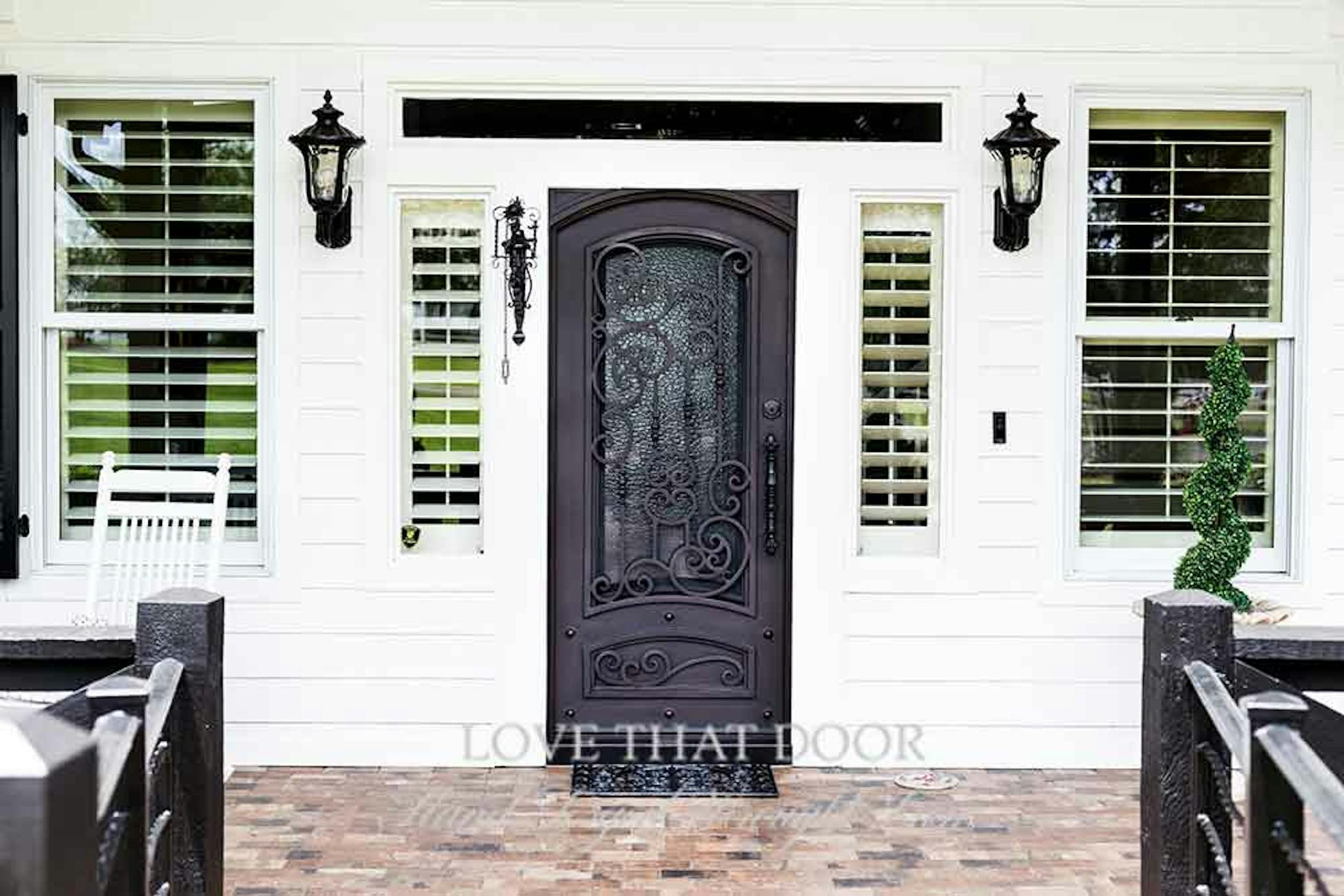 Single iron door with stunning floral motifs and intricate patterns