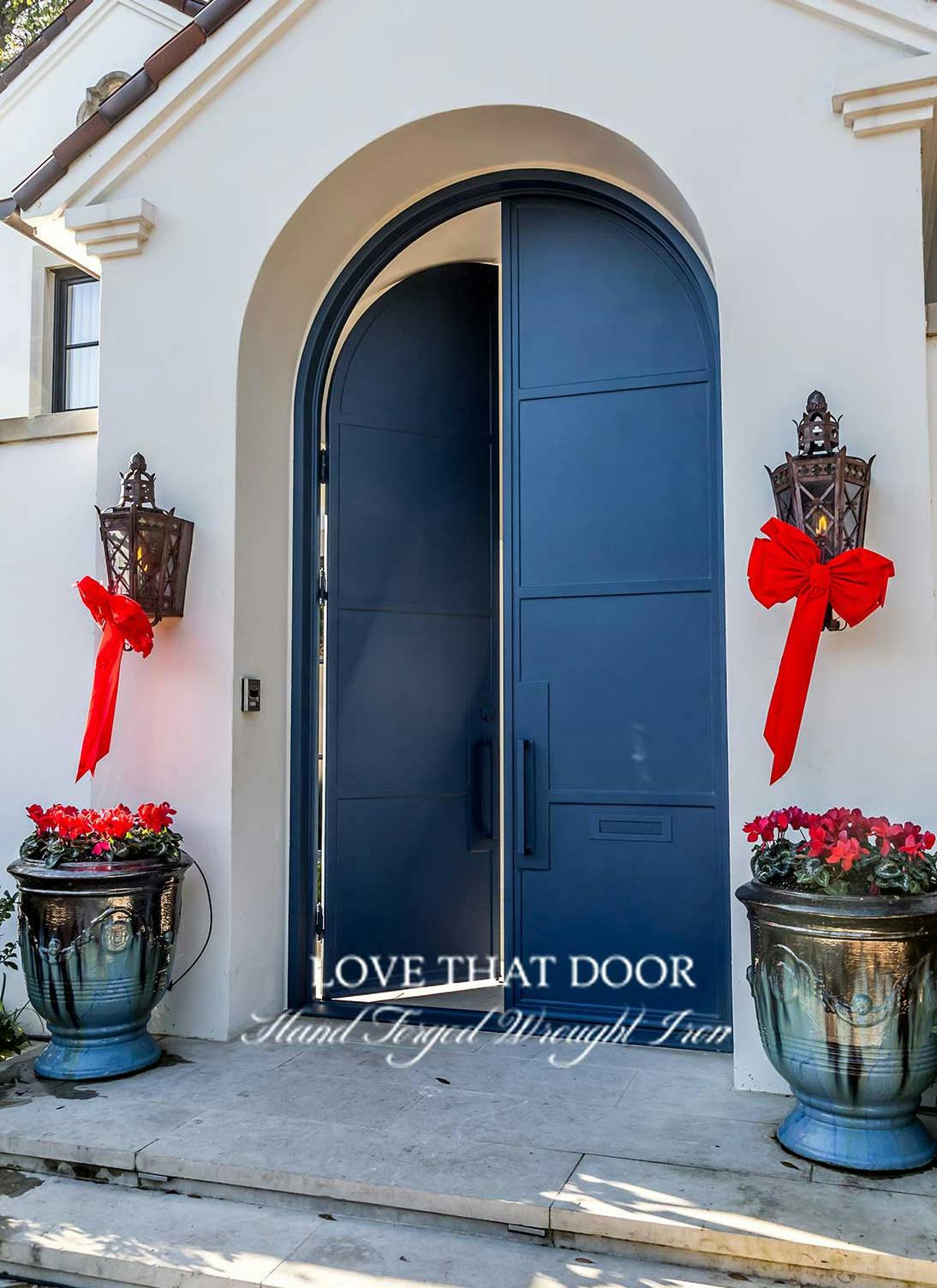 Custom iron double doors with unique design and personalized color and finish