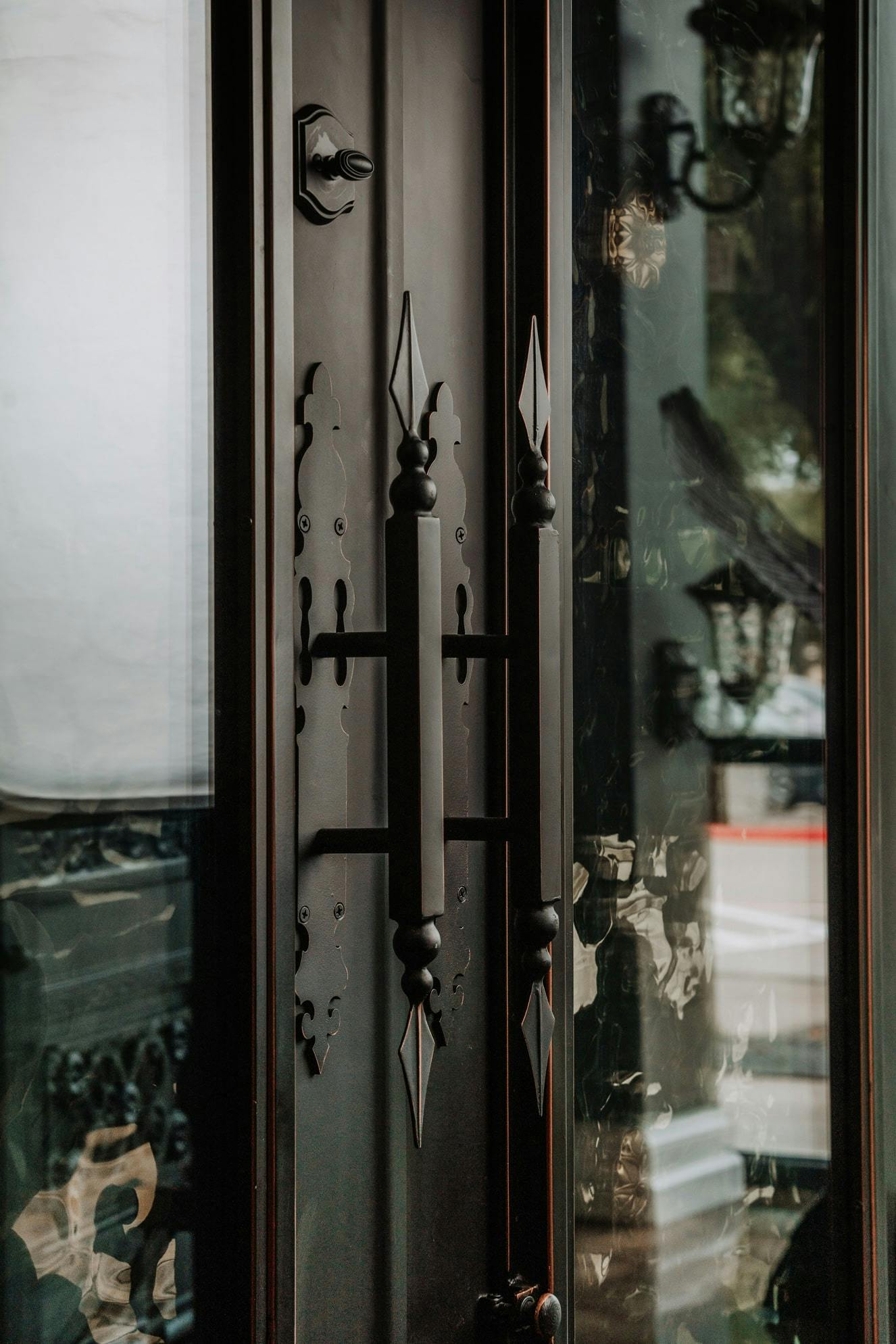 Handcrafted iron door with stunning artistic details and superior craftsmanship