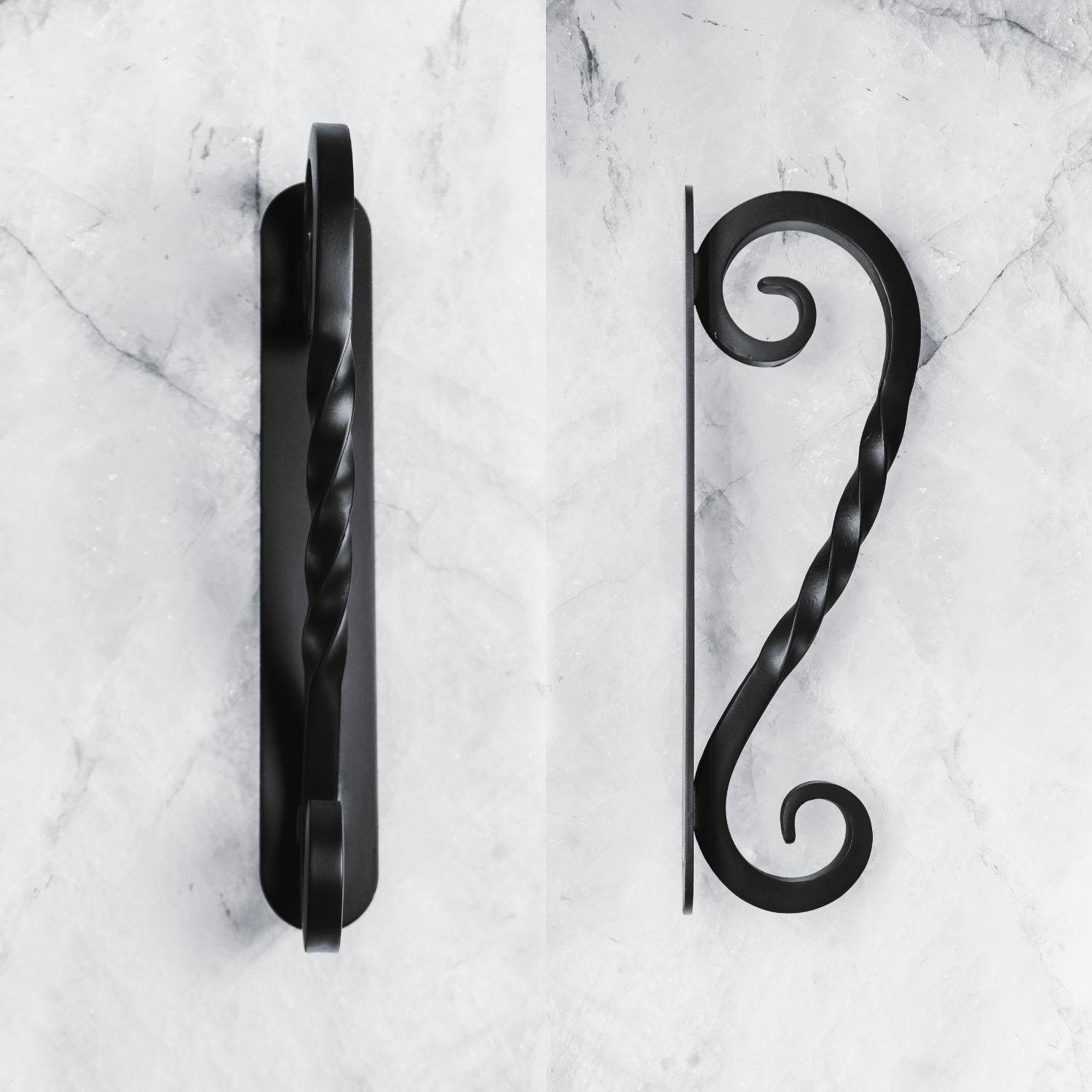 Iron door pulls with personalized monogram or emblem for added elegance