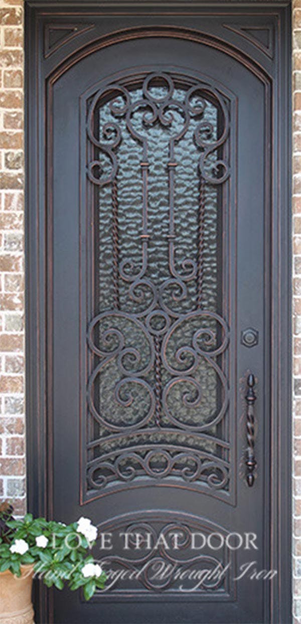 Single iron door with sidelights for added natural light