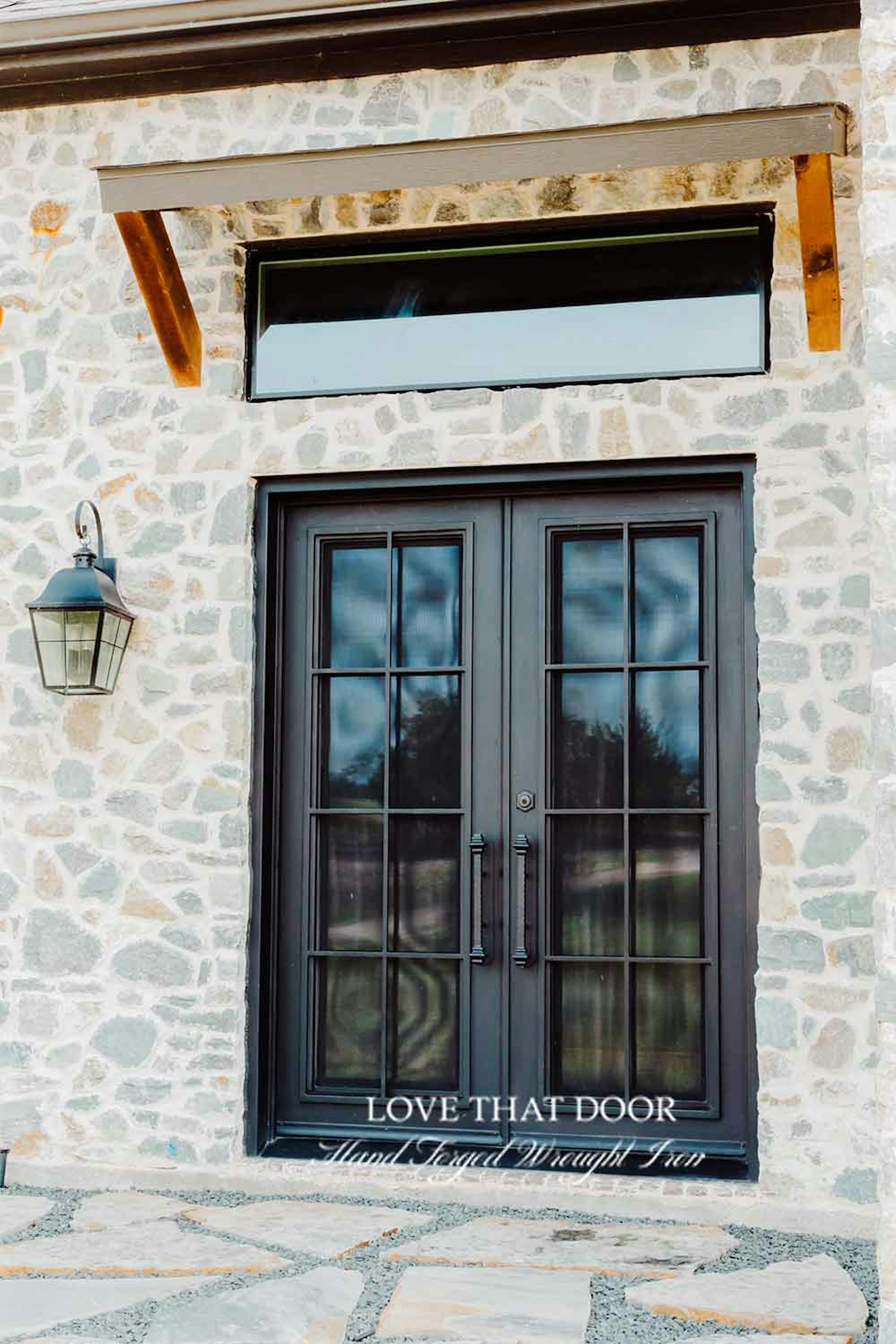 Iron double doors with unique handle and lock system for added security