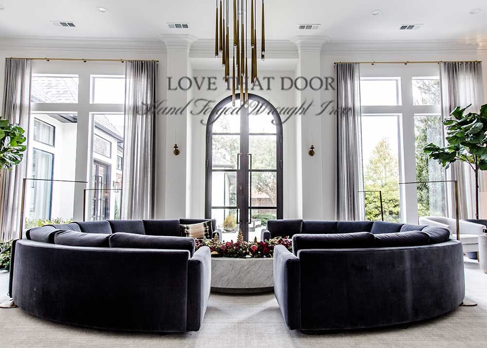 Iron double doors with beautiful finishes and elegant curves