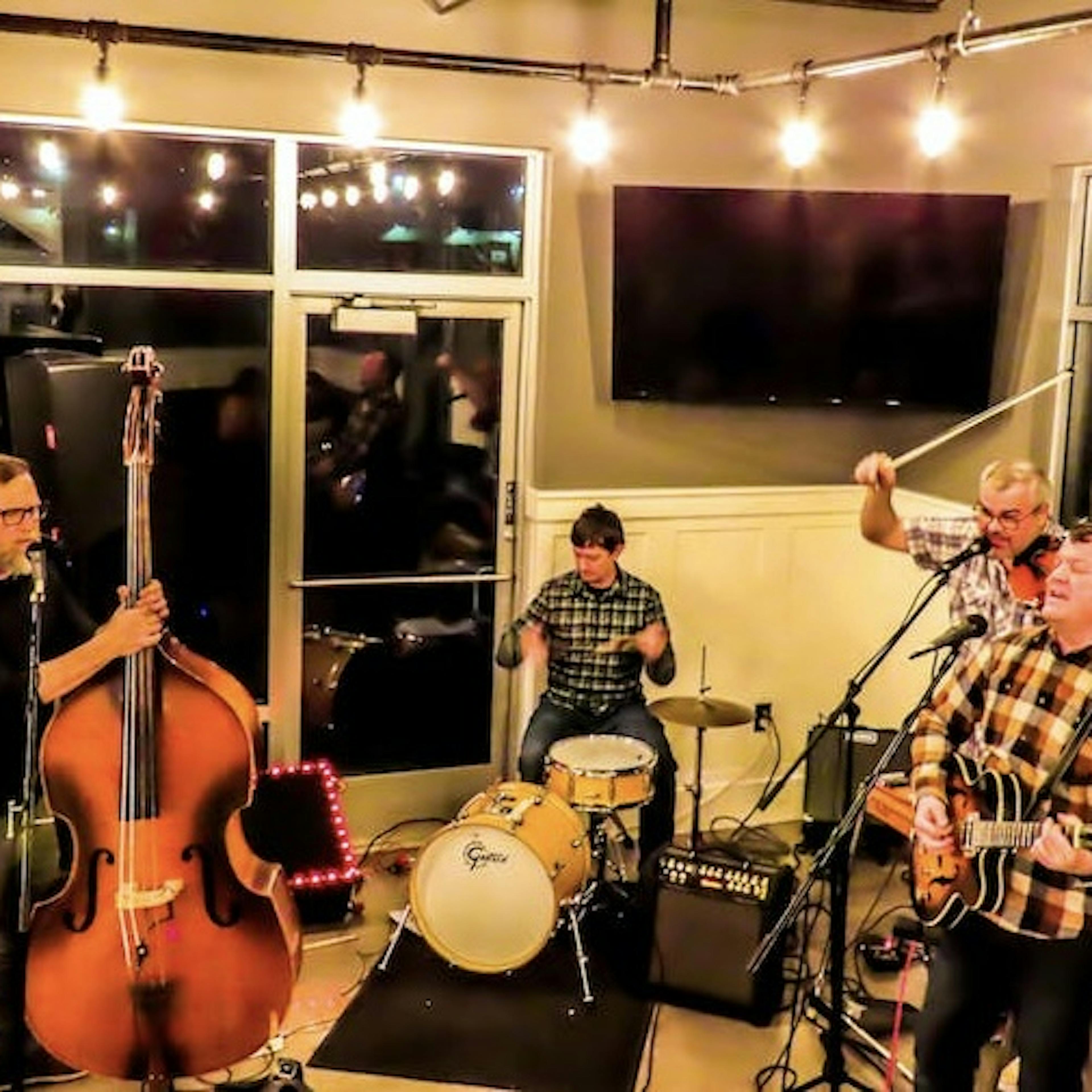 The Low Point band playing and singing with Gusto at Uinta Brewery.