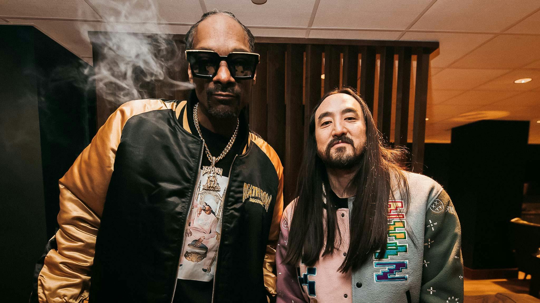 Snoop Dogg standing with Steve Aoki in promotion for ther A0K1VERSE