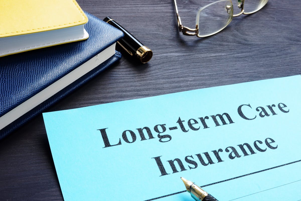 Long term Care Insurance policy on a table.
