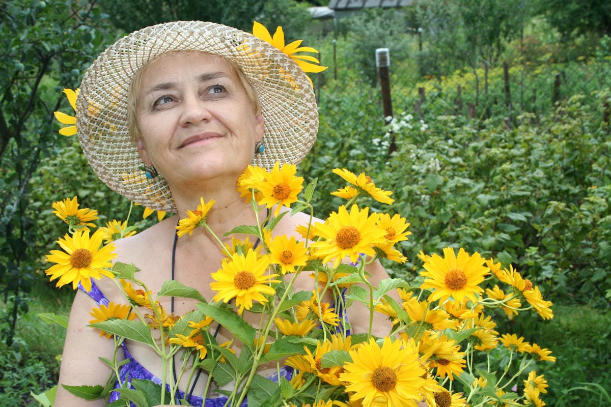 yellow flowers, lady in the garden