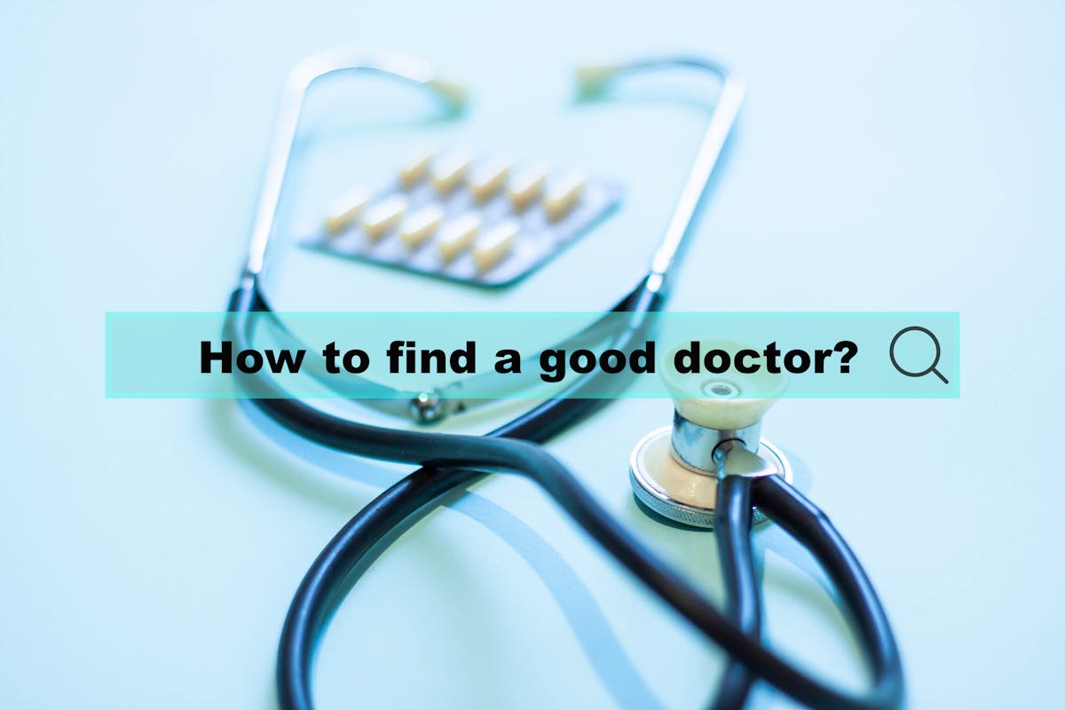 The concept of finding a good doctor. Medical text in a hologram on the background of a stethoscope
