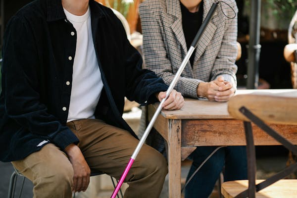 carer with a blind man