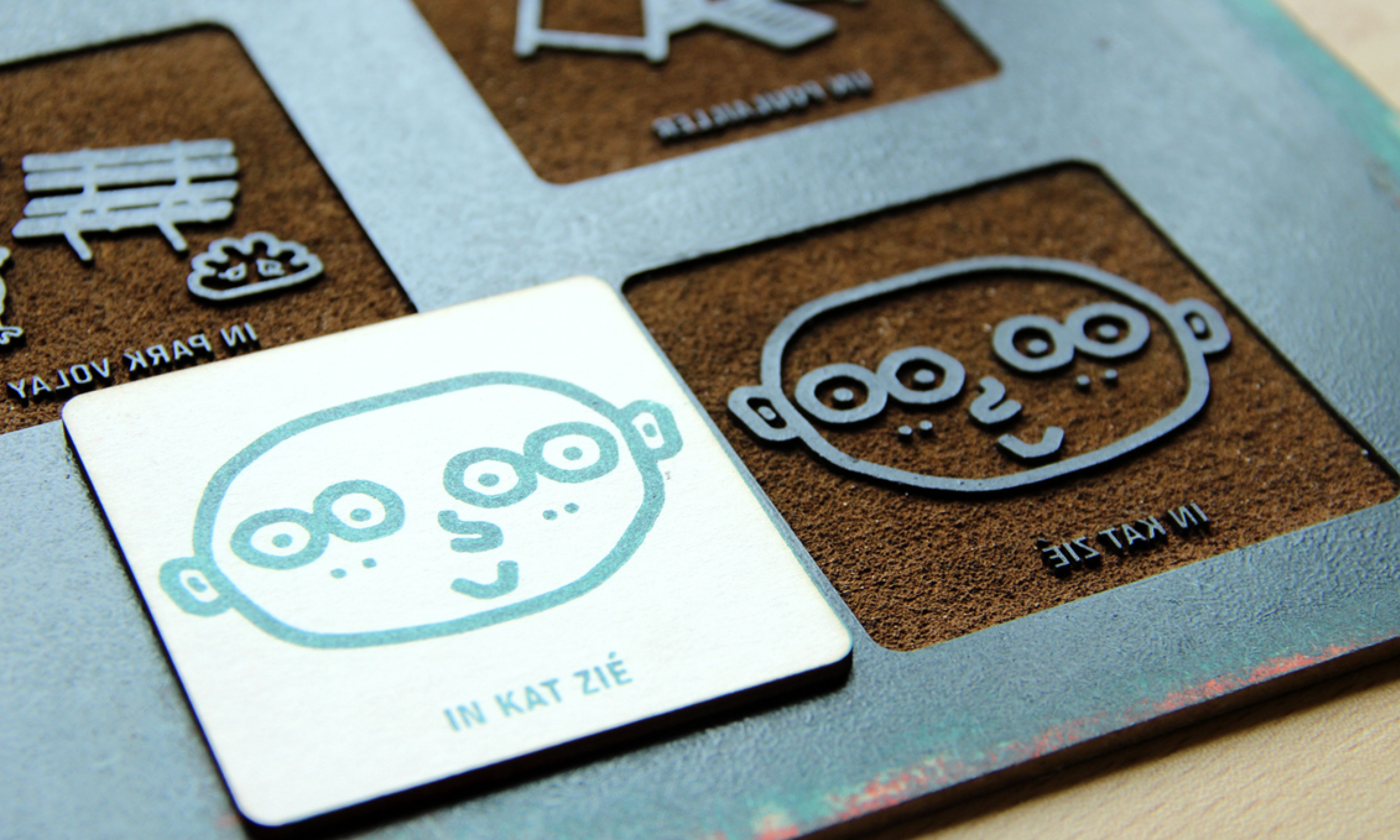 finshed product of laser cut pads and cards etched with a printing press