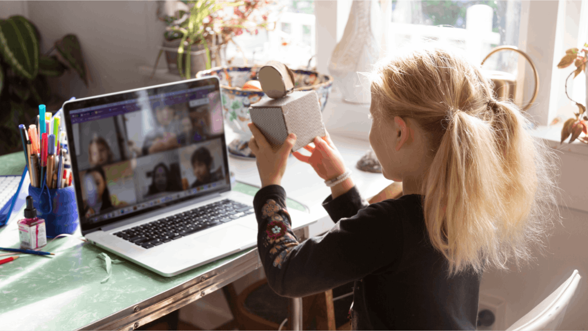 Teneo girl learning on laptop