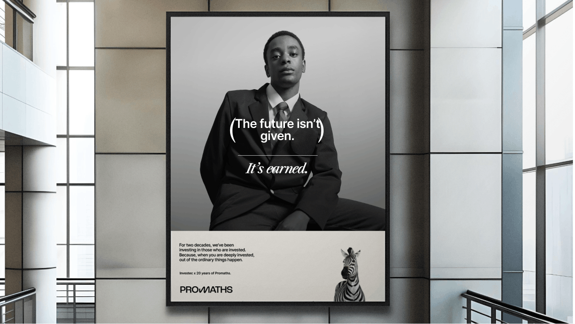 A billboard for Promath with the quote The future isn't given, it is earned.