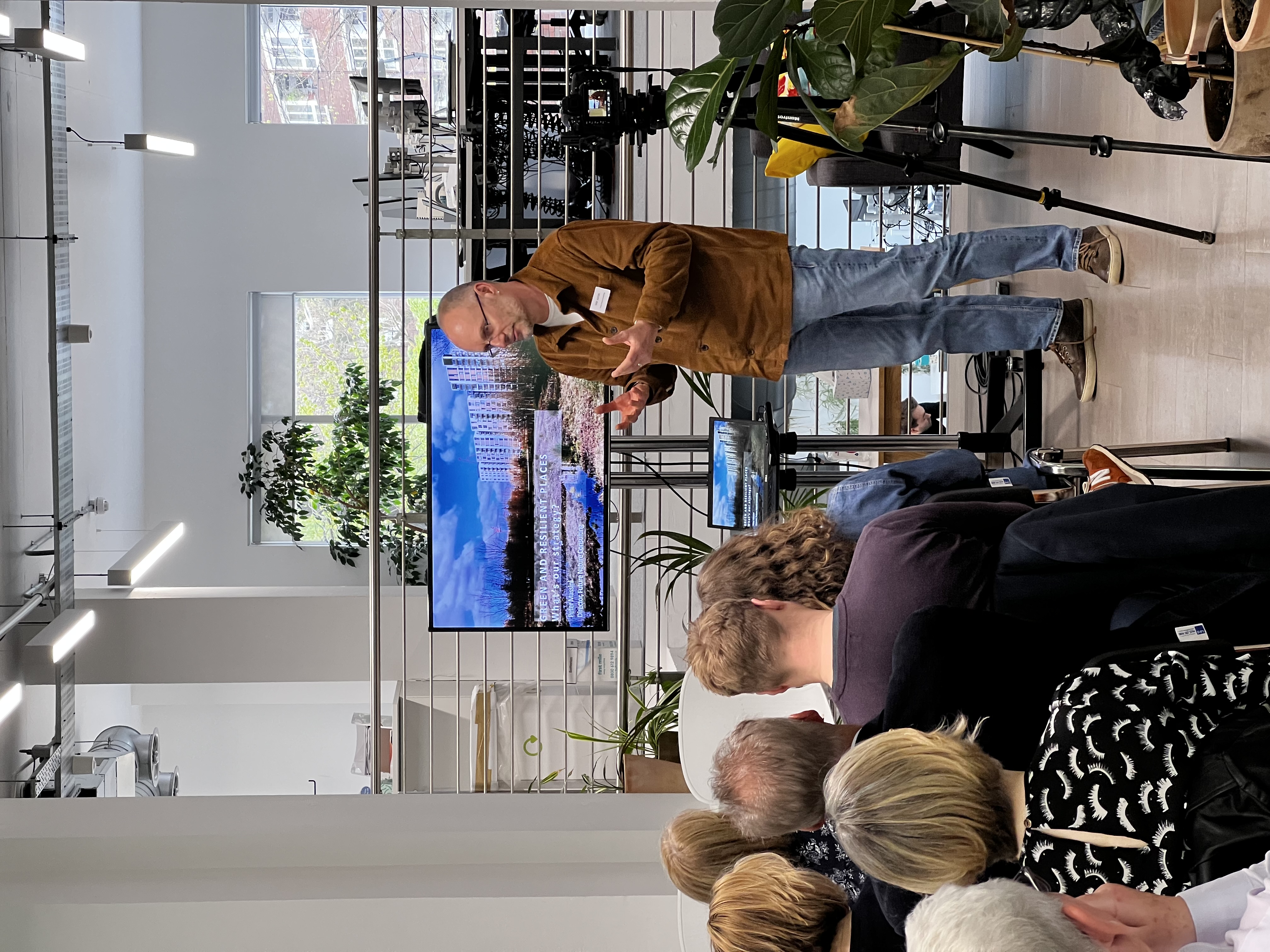 Crowd of people watching a speaker