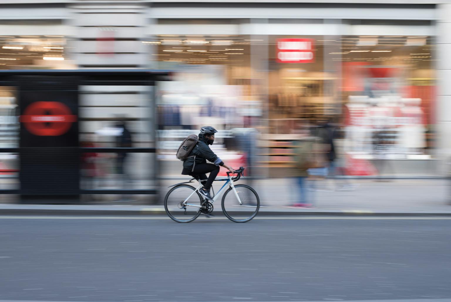 Man riding bike on London road