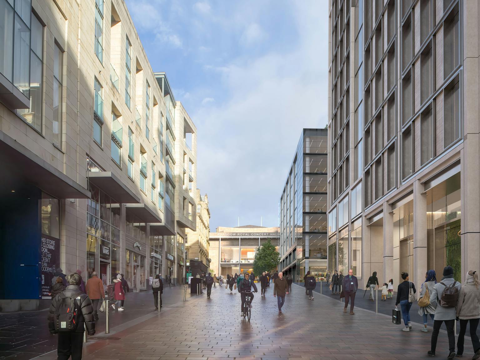 People walking through shopping district