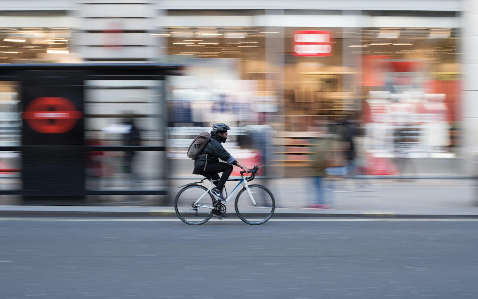 Person cycling in city