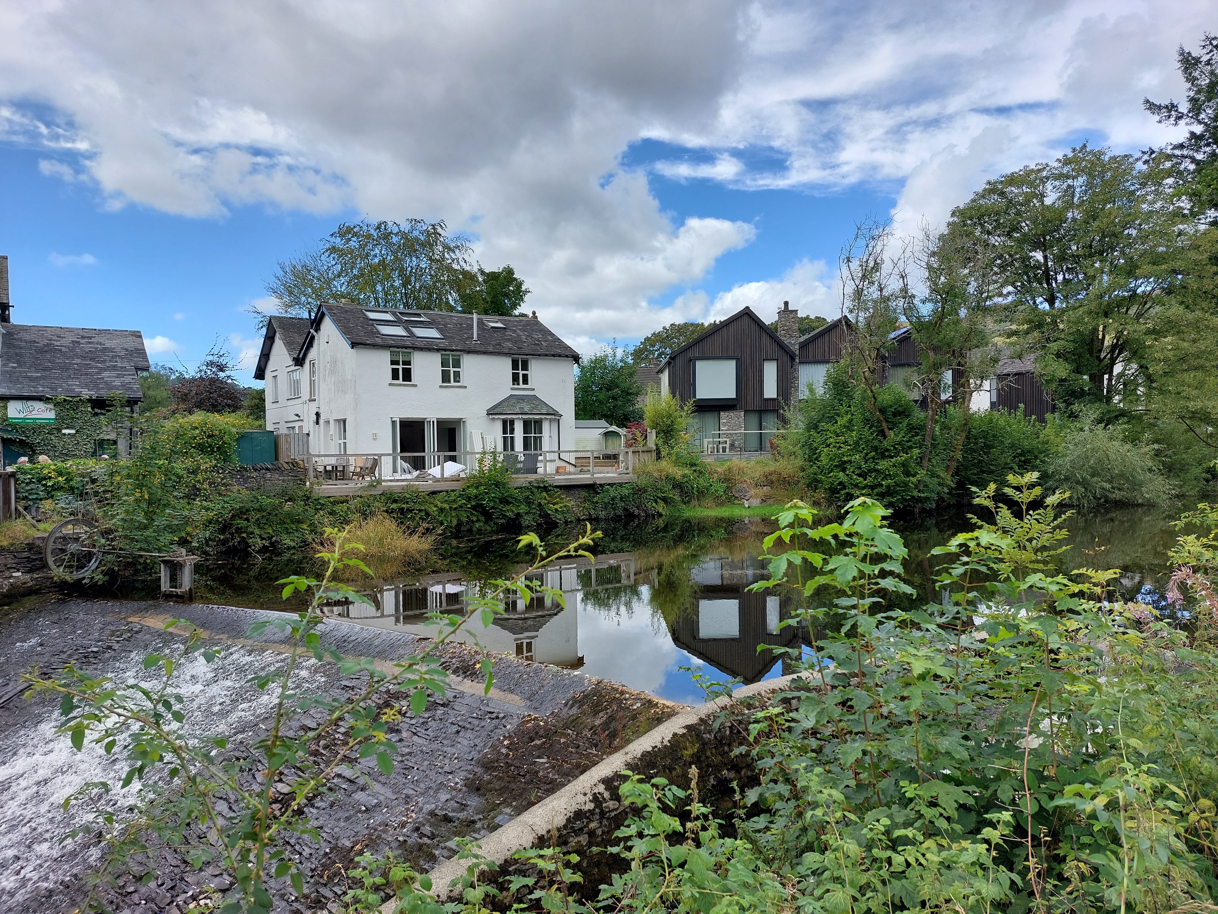 Houses behind a river