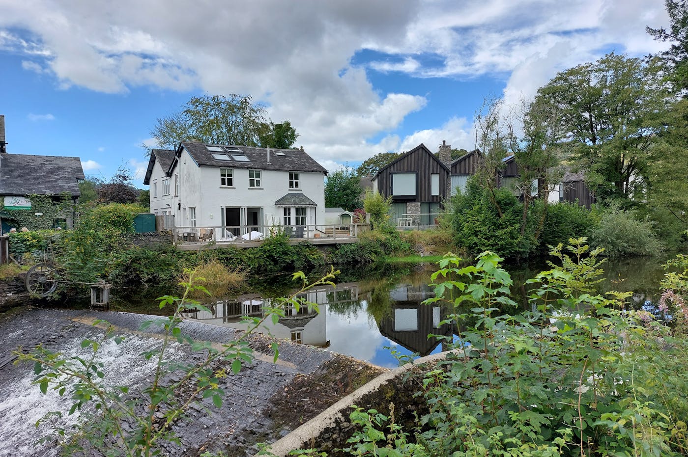 Houses behind a river