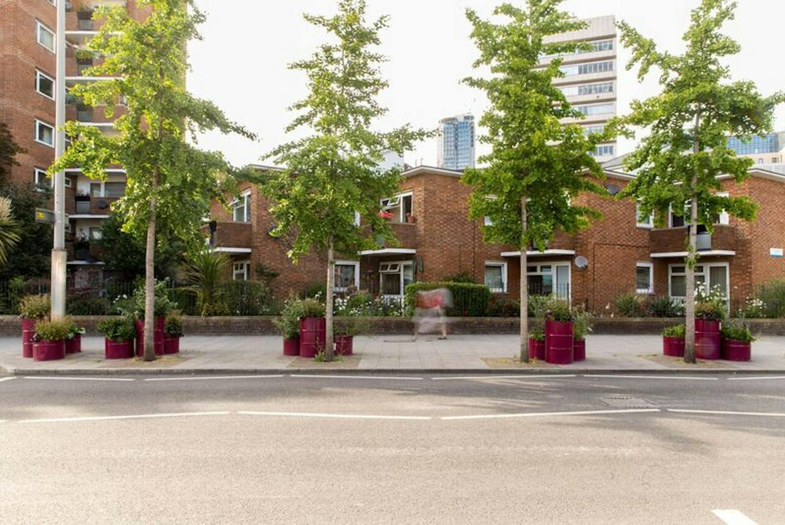 LUC's green barrel planters in Waterloo