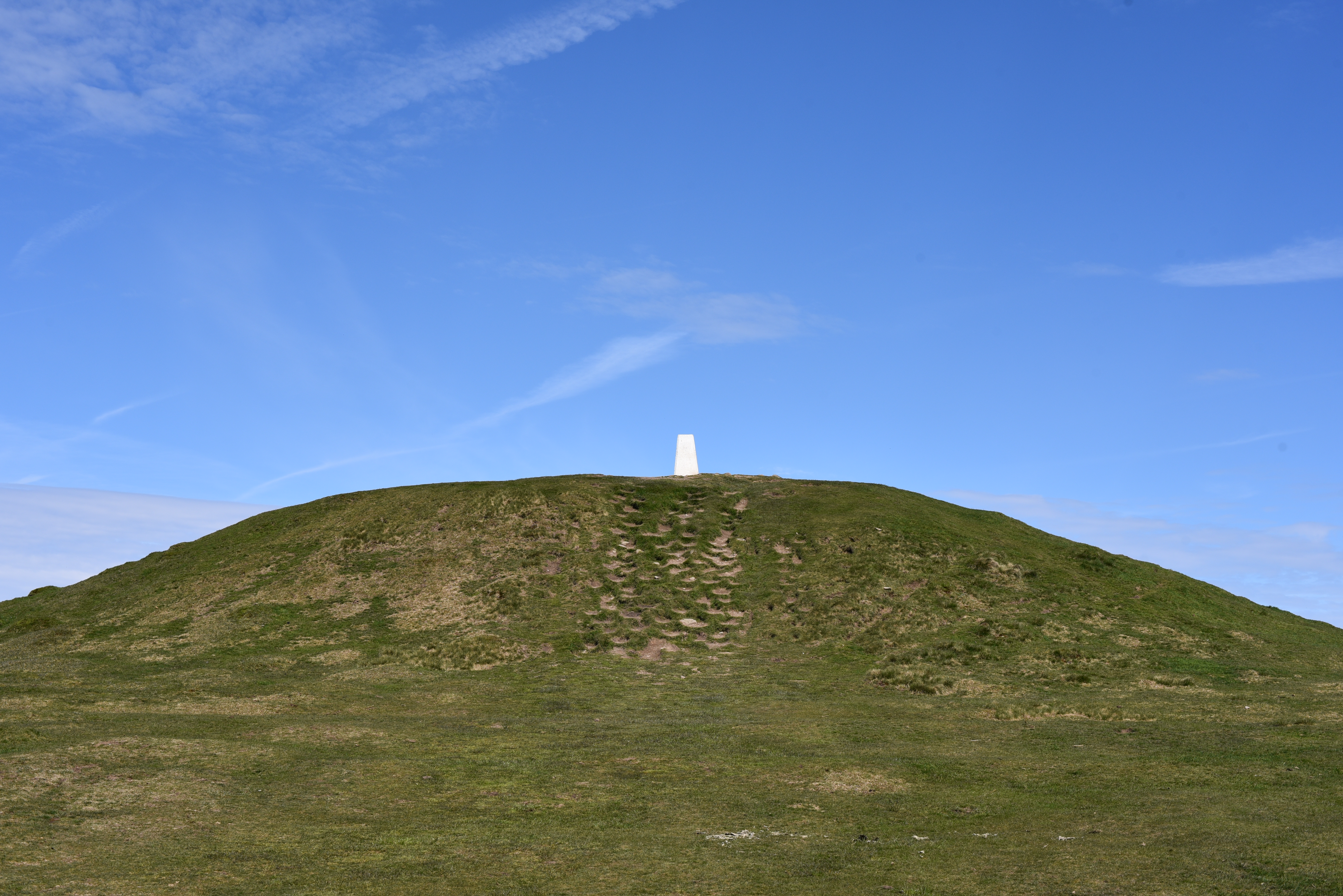 Small hill with a monument.