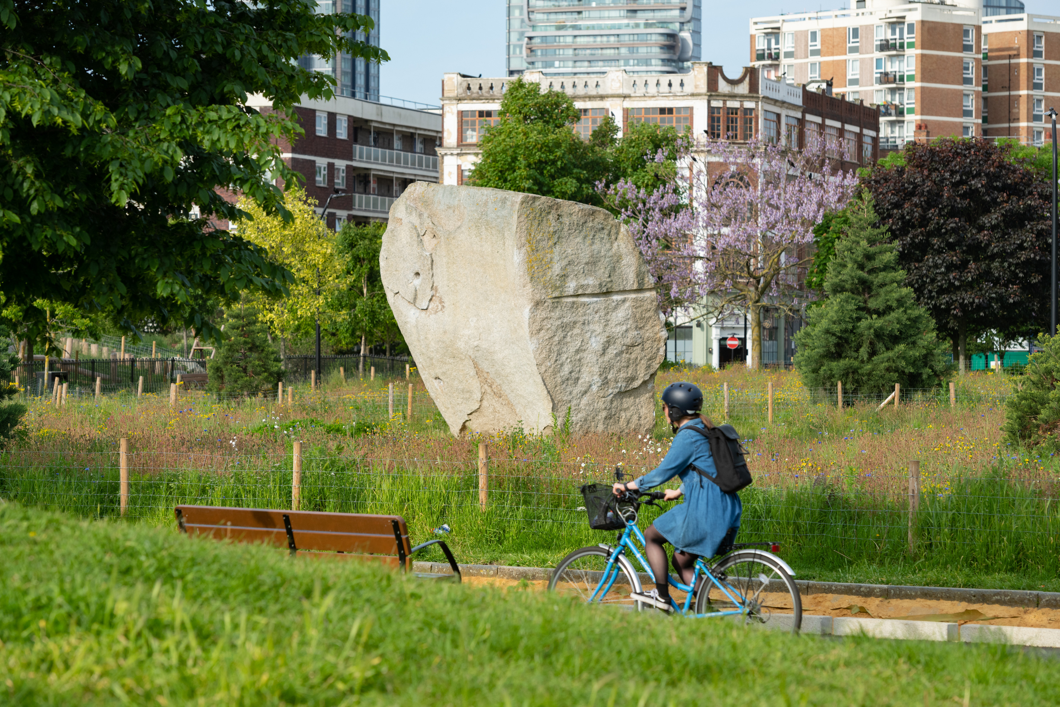a person on a bicycle in a park