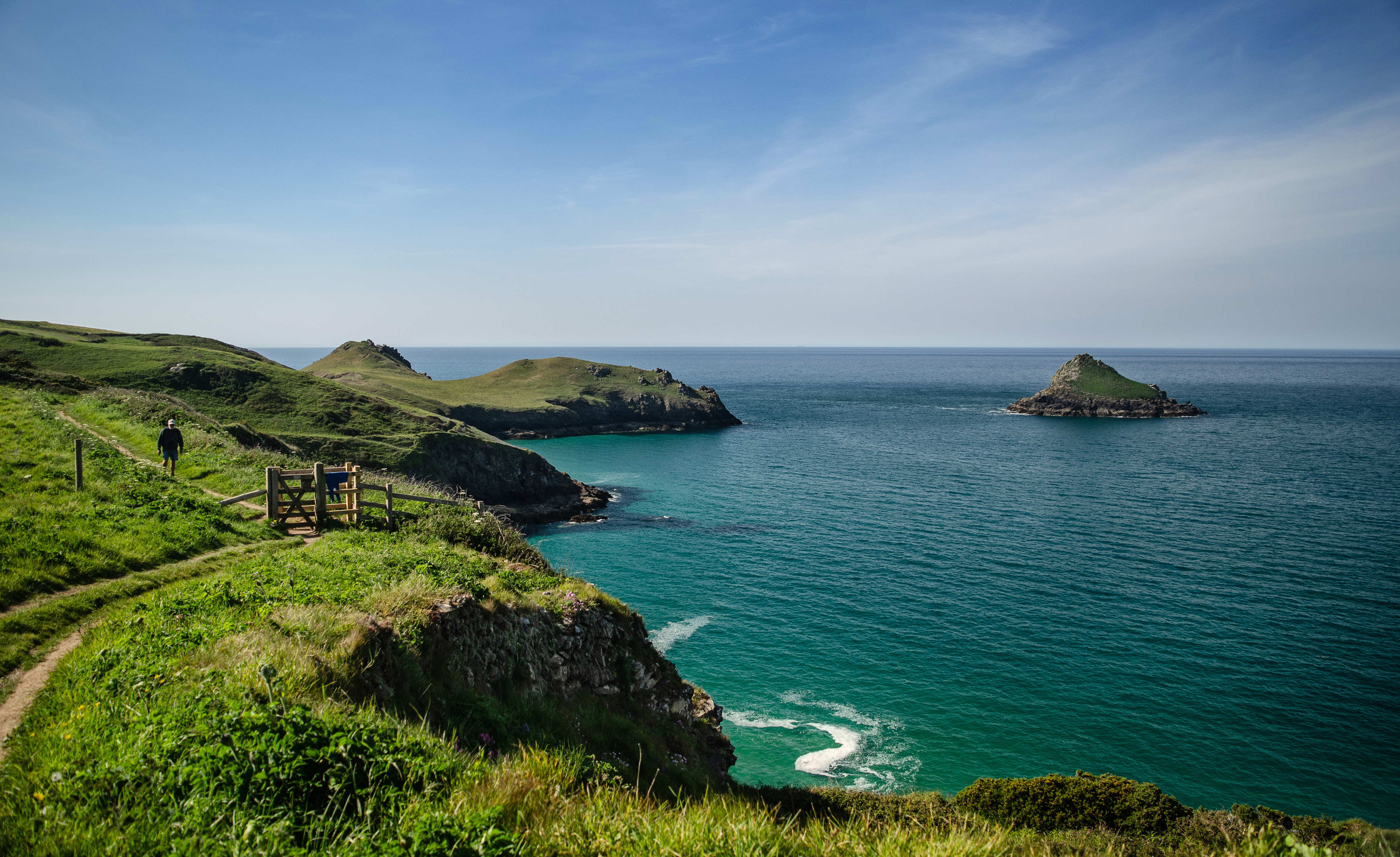 green hills and blue water