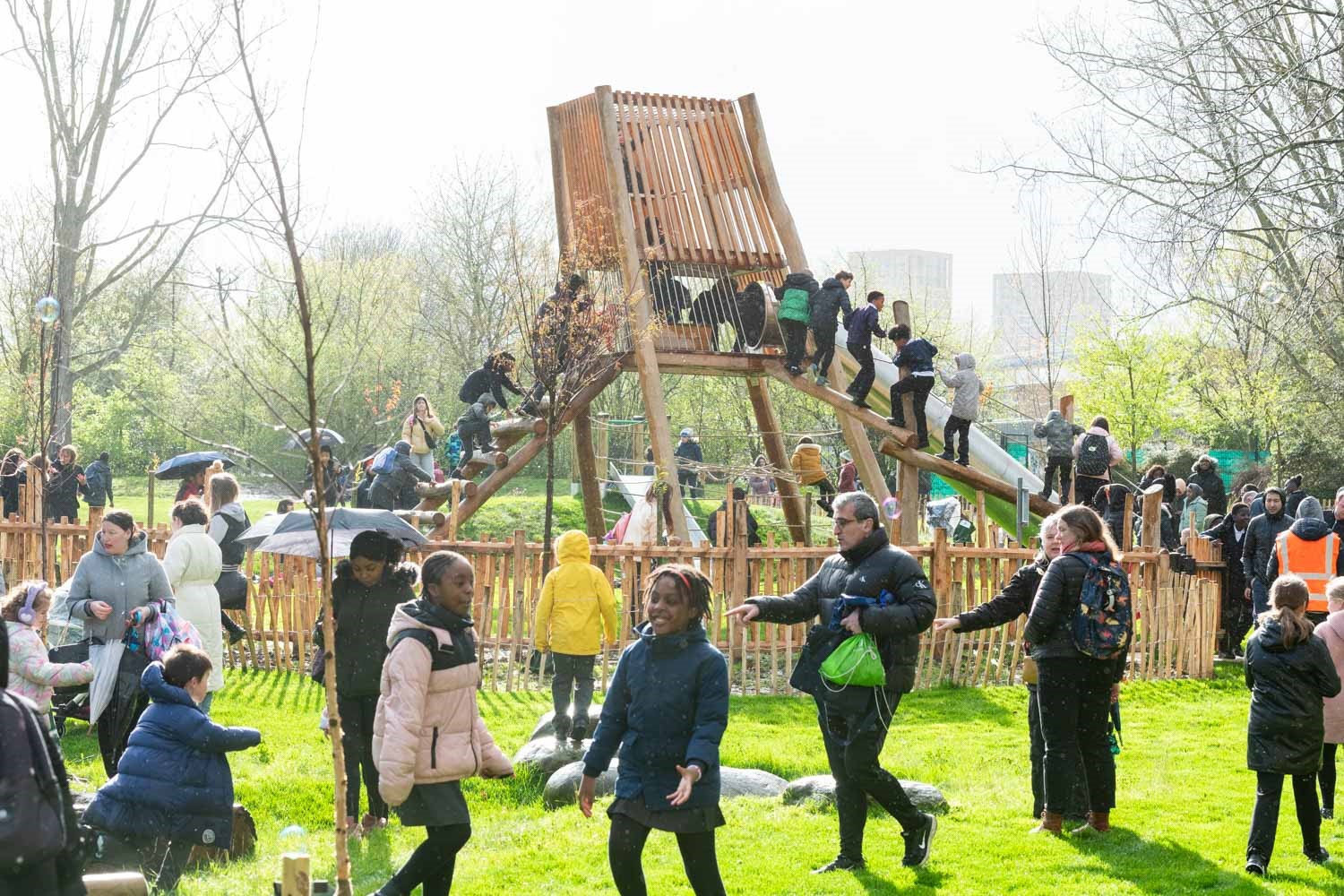 a group of people outside in a park